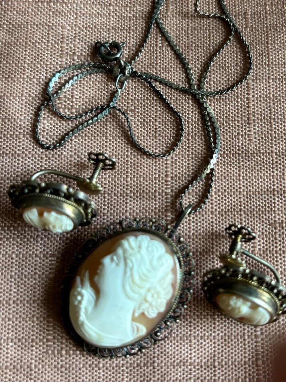 Classic three-piece cameo necklace and earrings ensemble